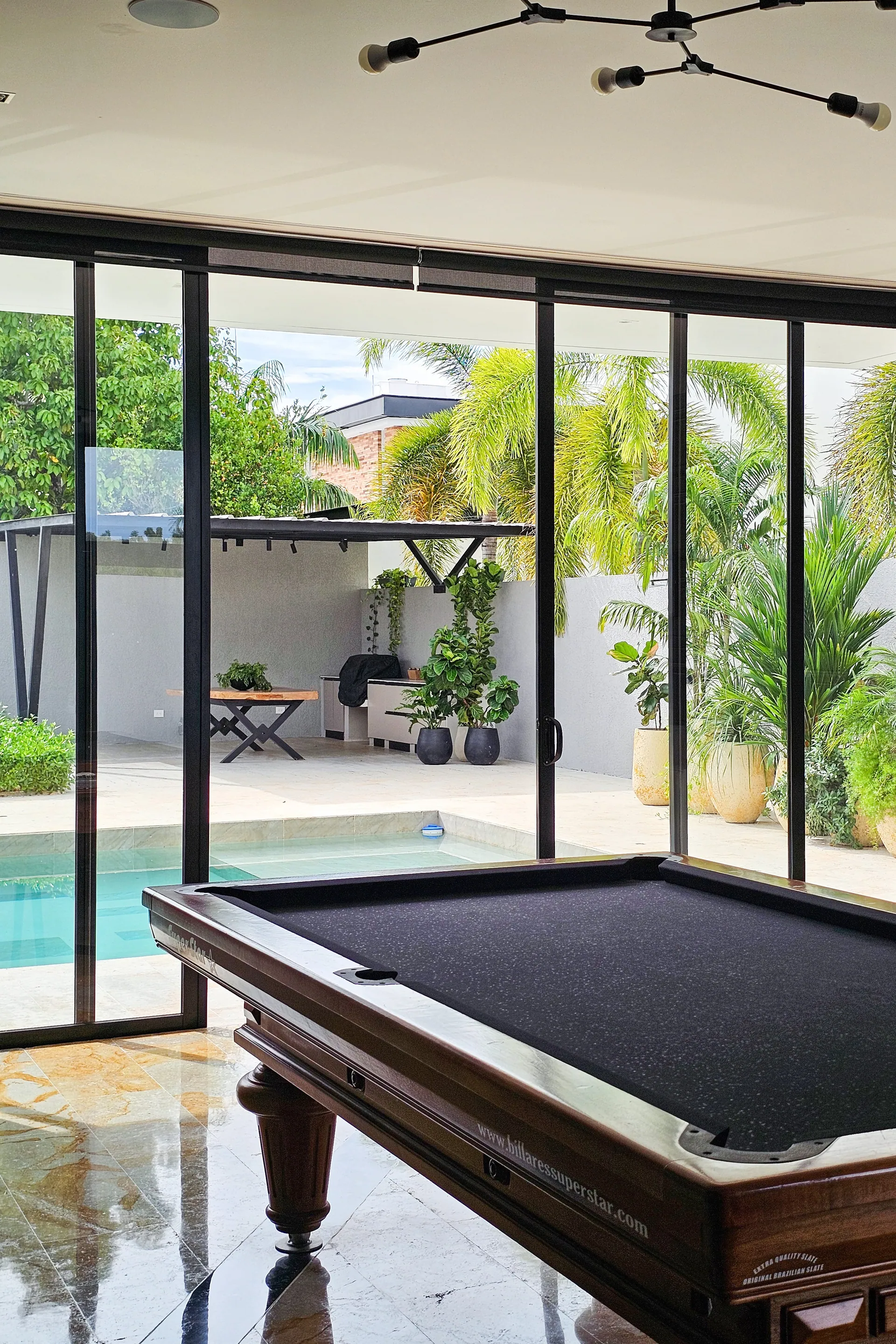 Casa FG · Salón billar patio